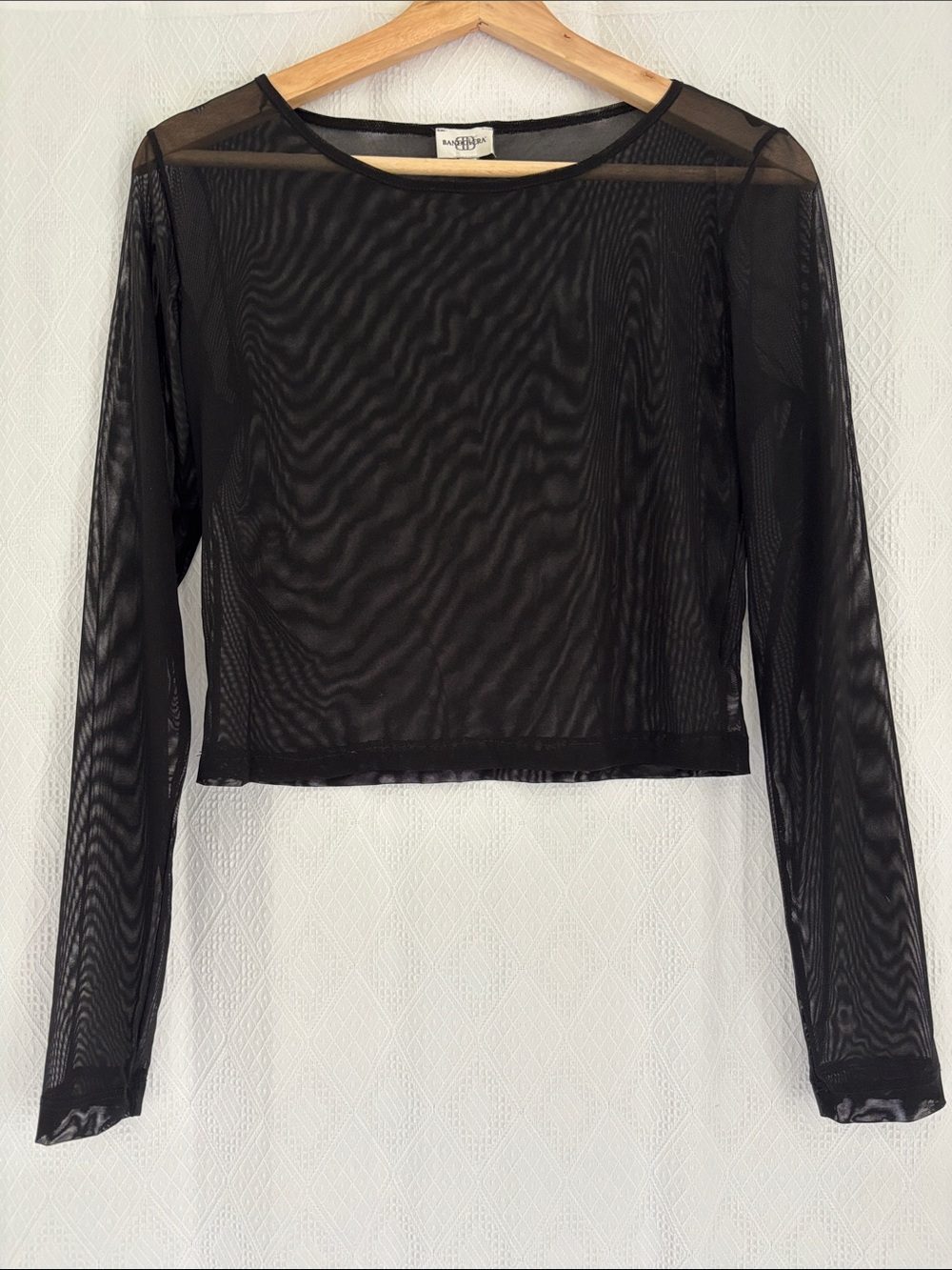Fine mesh stretchy black top